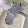 Minimalist grey ribbed knit socks presented on a clean white tray in a lifestyle setting - One Size / Light Gray