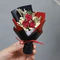 Detail of mini bouquet with three red dried roses and baby's breath in black-red wrapping - 3 Red Roses (Red Black Wrapping)