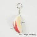 Realistic PVC rabbit-shaped apple slice keychain in red and white, 8cm height - Keychain / Red