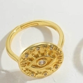 Adjustable gold evil eye ring with clear zircon crystals and embossed eye design - White Zirconia