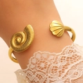 Adjustable golden open bangle with shell and snail shell sea life design details - Conch Scallop Ocean (K-519)