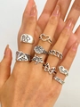 9-piece set of silver-toned rings featuring flower, heart, and butterfly retro designs - Vintage Floral Spiderweb Antique Silver Stackable Ring Set (0800)