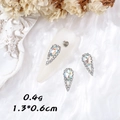 Water drop rhinestones for nail art with aurora crystal accent on a white background - Pear