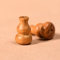Pair of natural wood gourd-shaped DIY pendant beads with visible grain for bracelets - Bocote Gourd