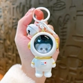 Portachiavi astronauta bianco con dettagli dorati e campanellino bianco per borse - Astronauta Luminoso - Panda Dorato