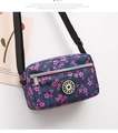 Dark blue oxford crossbody bag featuring pink cherry blossom print and SPORT logo - Purple Small Flower