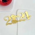 Close-up of golden acrylic 2024 cake topper with a cute cartoon dragon design - Dragon 2024 (Width approx. 8CM) / Gold