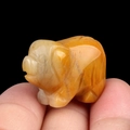 Mini hand-carved yellow crystal pig figurine with natural polished agate texture - Topaz