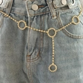 Chic golden metal waist chain with sparkling rhinestone heart pendant on denim jeans - Gold Circles