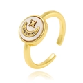 Detail of 18K gold plated ring with star and moon patterns on a mother of pearl center - Star Moon Mother Of Pearl Style (J-1158)