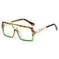 Stylish square tortoise and green sunglasses with hollow gold metal temples on white background - Leopard Green