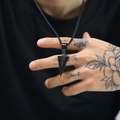 Close-up of matte black arrow pendant in titanium steel on a matching chain - Black Pendant Only (Without Chain)