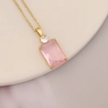 Close-up of 18k gold necklace featuring a pink rectangle gemstone and white zircon - Rectangular Pink Cut Gem (9#)