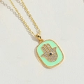 Hamsa Hand necklace with green enamel and sparkling crystals on a golden chain - Green