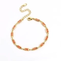 Bracelet doré 3x6mm serti de pierres orange rectangulaires et de zircons effet givré - Zircon Orange Or