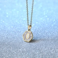 Golden hexagonal shell necklace with letter O pendant in stainless steel and white mother of pearl - Letter O