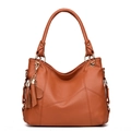 Caramel brown faux leather tote bag with tassel accent and pebbled texture - Brown