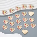 Dettaglio di ciondoli in smalto a cuore e occhio con placcatura in oro e motivi - Stile YJ13-01