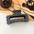 Detalle de la pinza negra para el pelo de Halloween con patrón de calaveras holográficas - 8,5 cm Cuadrado - Calavera Negra