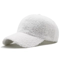 Détail de la texture d'une casquette en laine d'agneau blanche et tissu d'hiver chaud - Blanc