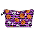 Detail of Halloween cosmetic bag showing glitter skull, ghost prints and black side strap - Purple Striped Skull Pattern (09131)