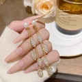 Elegant gold tassel earrings featuring white pearls and marquise-cut zircons for women - Gold Petal Drop (E0061)
