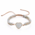 Macro detail of hand-woven emperor stone bracelet with heart pendant and bead textures - Light Blue Stone Style (Style-06)