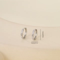 Detailed view of silver hoop earrings with zircon inlay showing 1.2cm height dimension - One Pair / White Gold (E071320bkb)