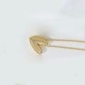 Golden necklace with heart pendant featuring pave-set sparkling crystals - Letter V