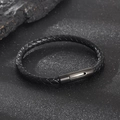 Braided black leather bracelet for men featuring a dark metallic magnetic clasp - 21cm / Black