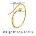 Detailed size chart of snake-shaped gold cuff bracelet showing diameter and weight info - Minimalist Snake