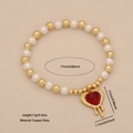 Imitation pearl beaded bracelet with red heart pendant in gold and white finish - Melted Lava Heart Bracelet (6#)