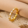 Elegant gold band ring featuring rectangular step-cut zircons in a classic claw setting - Gold Baguette Claw Set Ring (DZ-531)