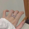 Chic silver finish ring with row of rectangular pink crystals in a channel setting - Pink Zirconia Wide Ring