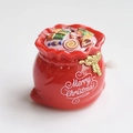 Wind-up red gift bag toy with Merry Christmas text and miniature holiday decorations - Wind-up Gift Bag