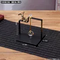 Square black metal napkin holder with golden bunny weight and crystal ball accent - Square Lying Rabbit Style / Black