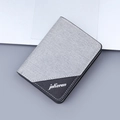 Short bi-fold grey canvas wallet for men featuring a two-tone design and white stitching - 730 Vertical / Gray