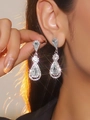 Sparkling silver pear-shaped drop earrings with clear crystals and pavé halo diamonds - Silver Double Pear Shape Drop Earrings