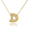 Macro shot of gold-plated D-letter pendant with pavé cubic zirconia on box chain - Letter D