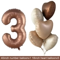 Macro detail of a 40-inch number 3 and heart-shaped foil balloons in cocoa and cream colors - Chocolate Number 3 / Number And Heart Balloon Combination