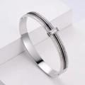 Zilveren armband met drievoudige rij zwarte en witte zirkoon en baguette-geslepen steen - Staalkleur