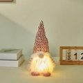 Roze kerstkabouter met lovertjes, warm gloeiende LED-baard en gestreepte armen decor - Roze