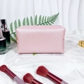 Pink cross-grain PU leather makeup bag with pearl initial and golden zipper detail - Medium / Pearlescent Pink