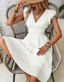 Detailed view of white Broderie Anglaise V-neck dress with ruffle sleeves and elastic waist - S / White