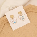 Dettaglio di orecchini a cuore malocchio con perni S925 e cristalli multicolore - Cuore Malocchio (2# Bianco) / Bianco