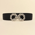 Detail of a black elastic belt featuring a prominent silver double-ring metal buckle - Black Silver