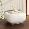 White glazed ceramic storage jar featuring dual duck figurines on the lid - Spring River Duck [White-Square]