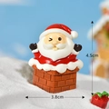 Miniature resin Santa Claus in chimney ornament with snow details, size 4.5cm by 3.8cm - No. 9 Santa Peeking from Chimney