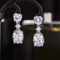 Silver heart and oval drop earrings with sparkling clear cubic zirconia stones - A Pair Of White Diamond Led-123