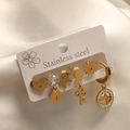 Detailed close-up of a 6-piece golden stainless steel earring set with zircon accents - 6Pcs Set-Elephant Heart Lock